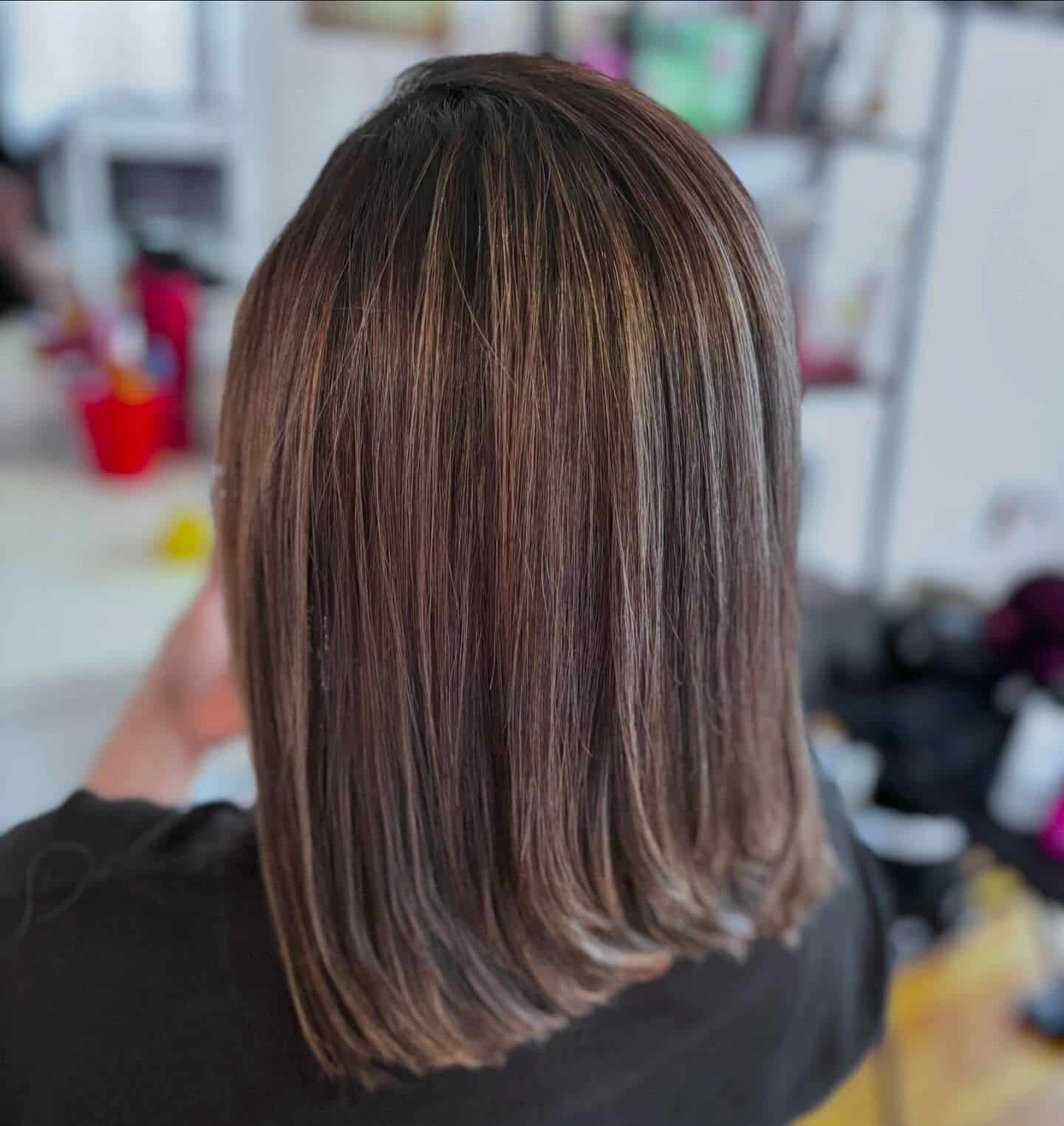 10. Ash Brown Lob with Soft Highlights - Medium Brown Hair Color