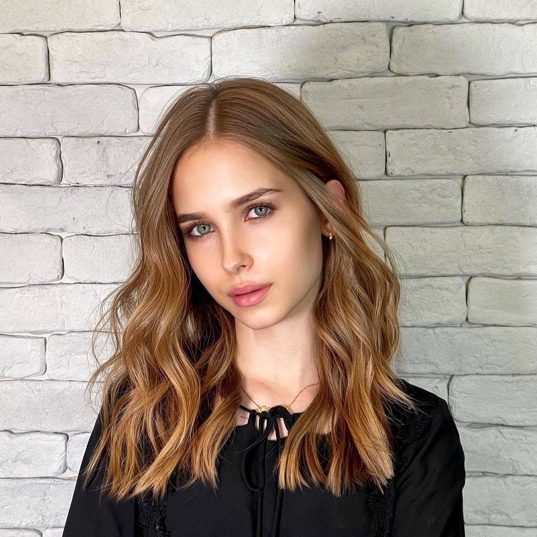 11. Soft Walnut Waves with Natural Gloss - Medium Brown Hair Color