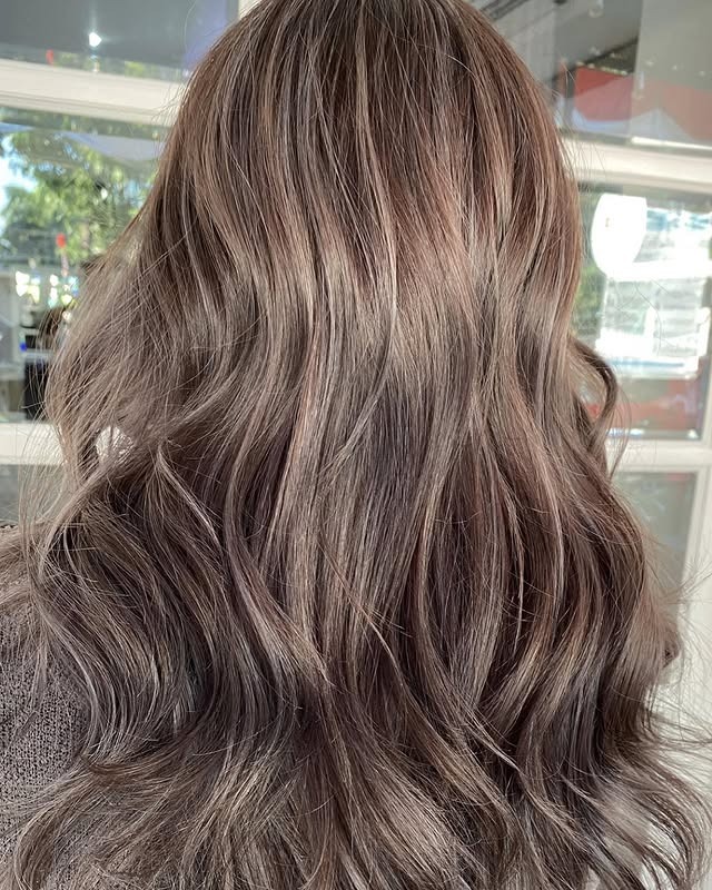 21. Smoky Ash Brown Waves with Dimensional Shine - Medium Brown Hair Color