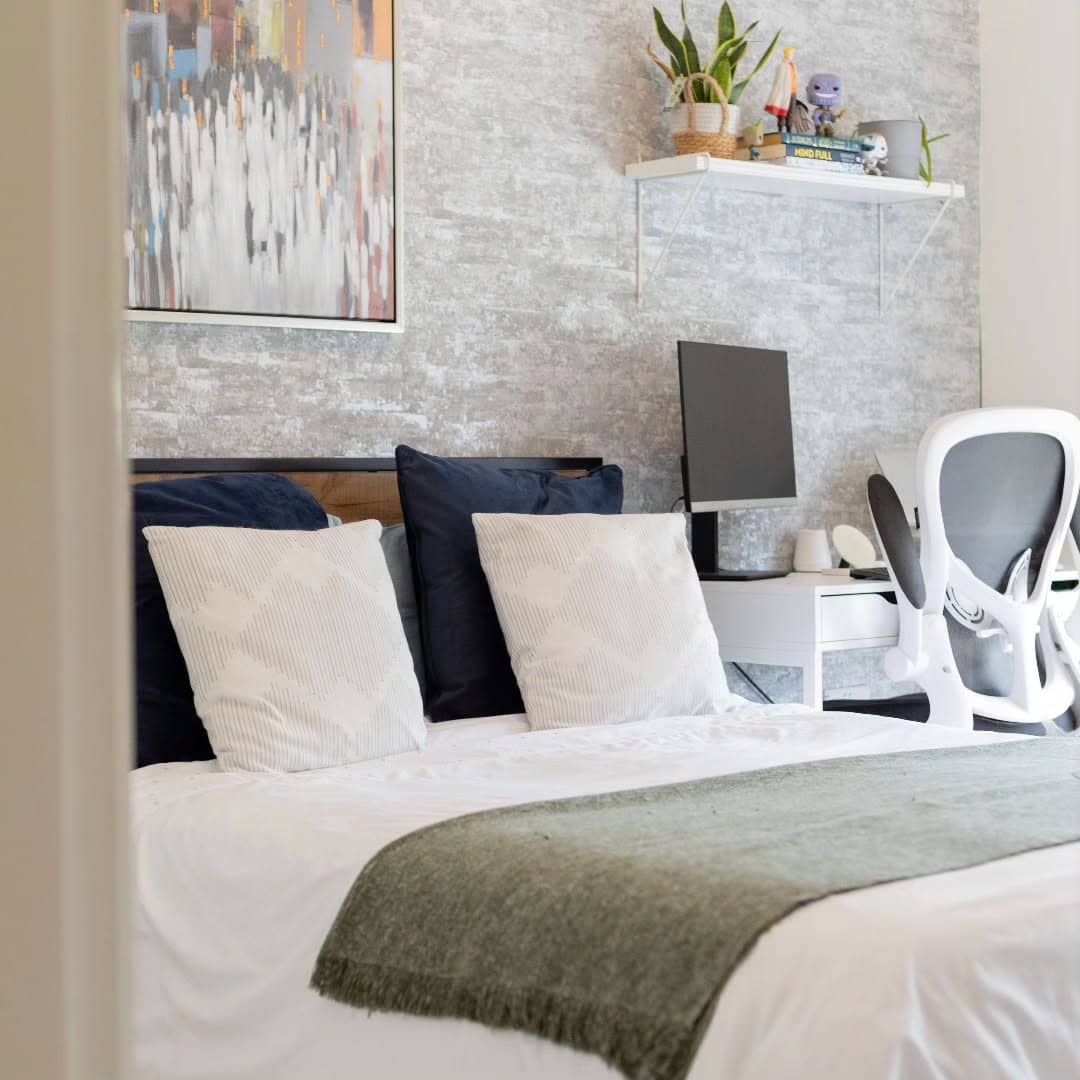 18. Calm Bedroom Office in Neutrals - guest bedroom office ideas