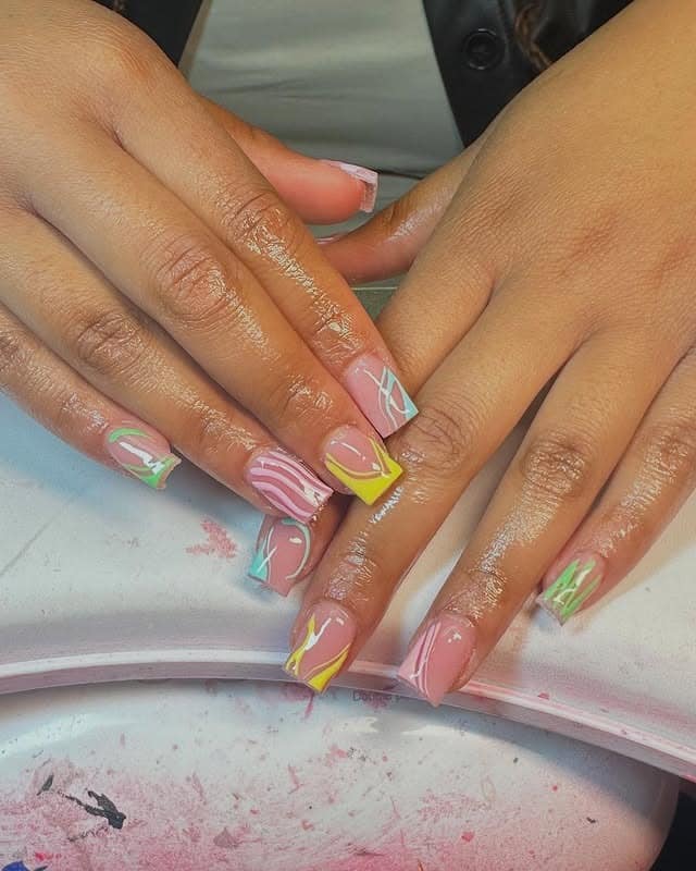 3. Pastel Wave Art - short spring nail ideas