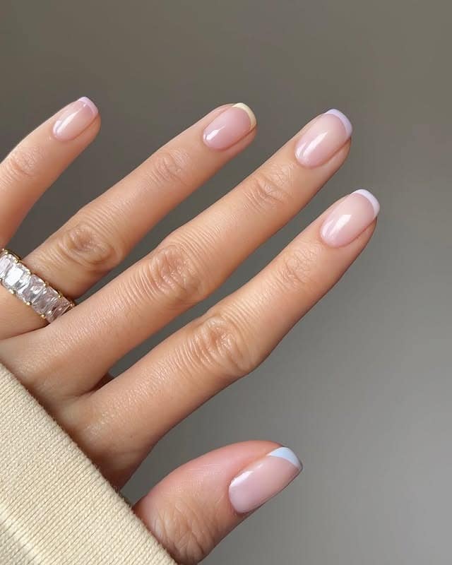 7. Soft Edge Pastel French - short spring nail ideas