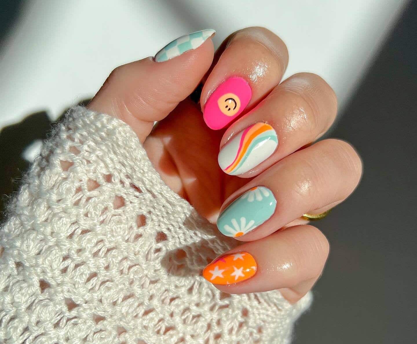 11. Retro Rainbow Smiles - short spring nail ideas