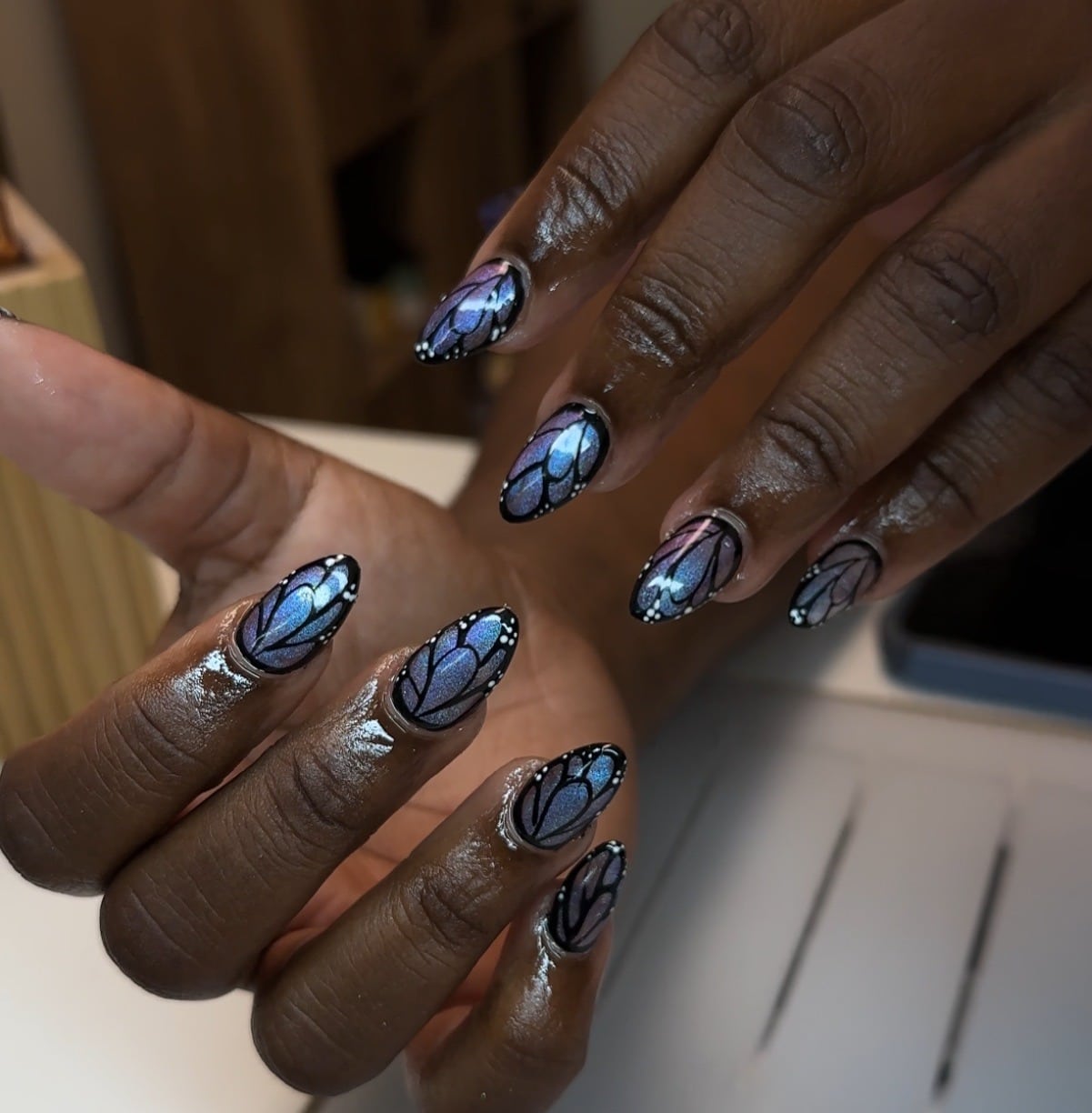 12. Iridescent Butterfly Wings - short spring nail ideas