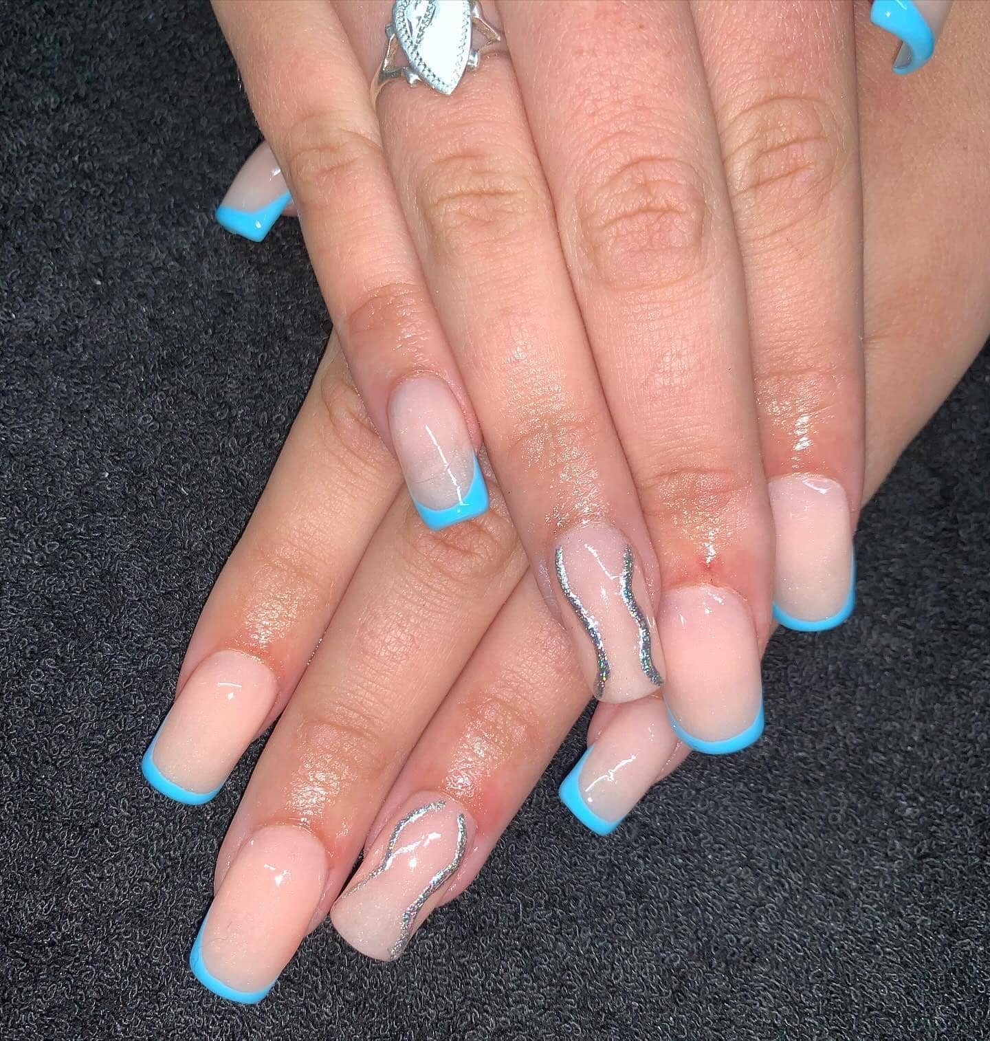 11. Skyline Blue French Tips - silver and blue nail ideas
