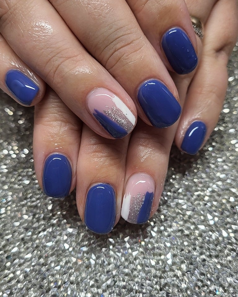 17. Sapphire Brushstroke Nails - silver and blue nail ideas