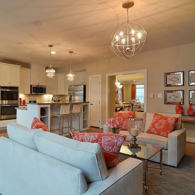 1. Coastal Coral Comfort - beachy living room ideas