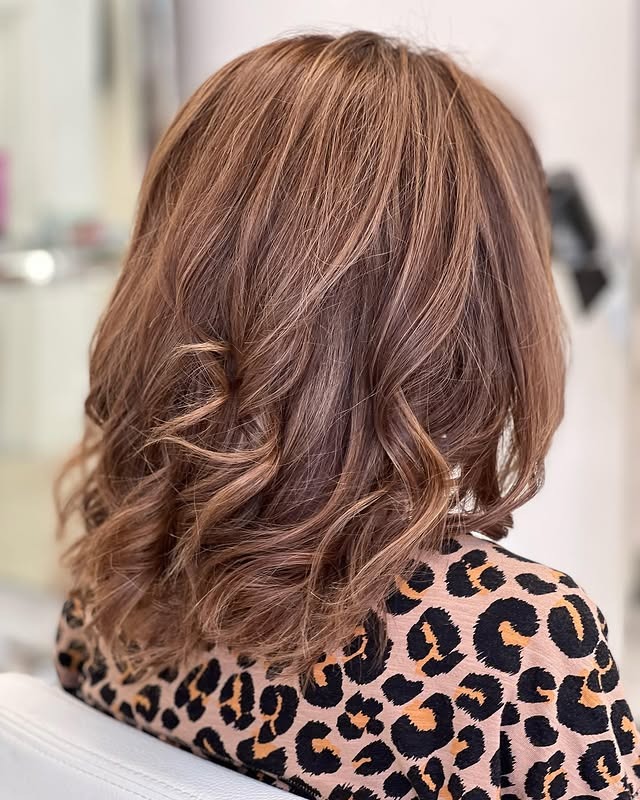 2. Layered Chestnut Bob with Luminous Shine - Chestnut Hair Color