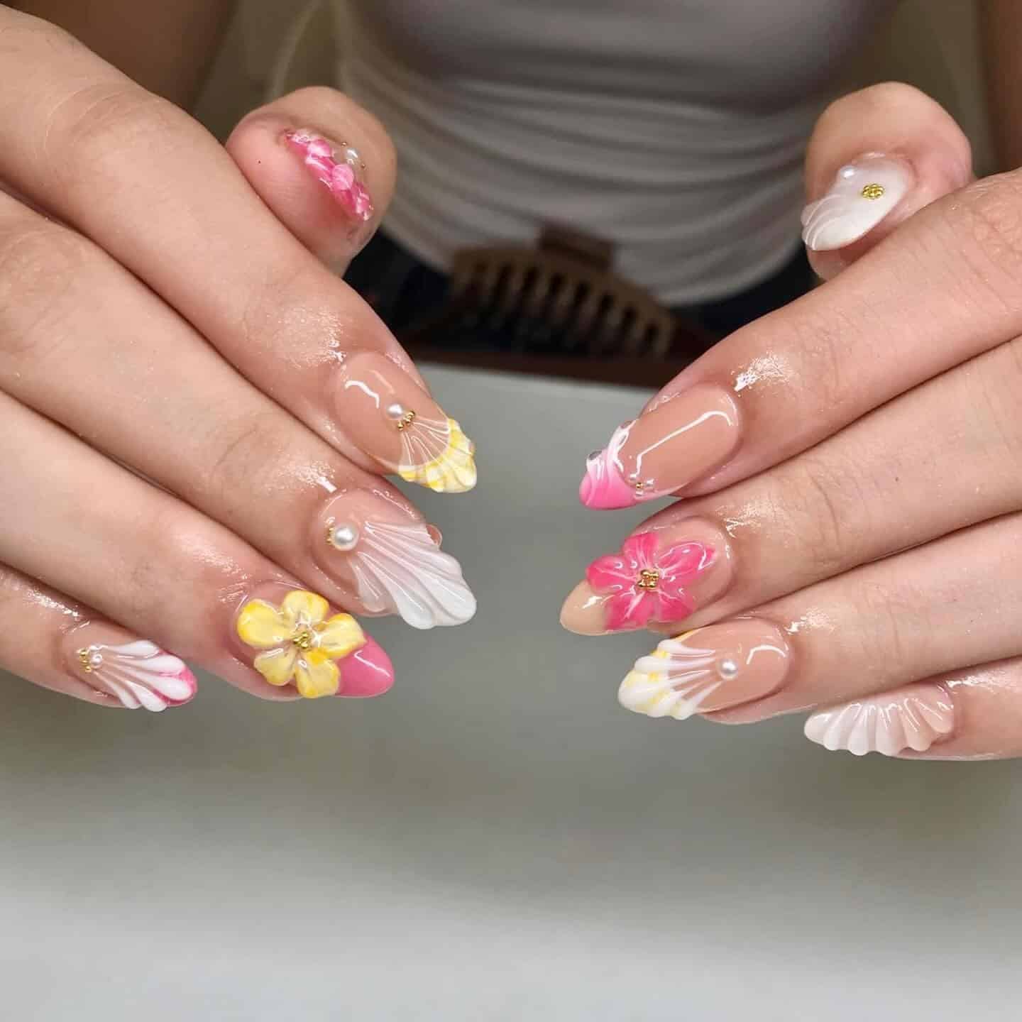 6. Seaside Blooms - simple beach nail ideas