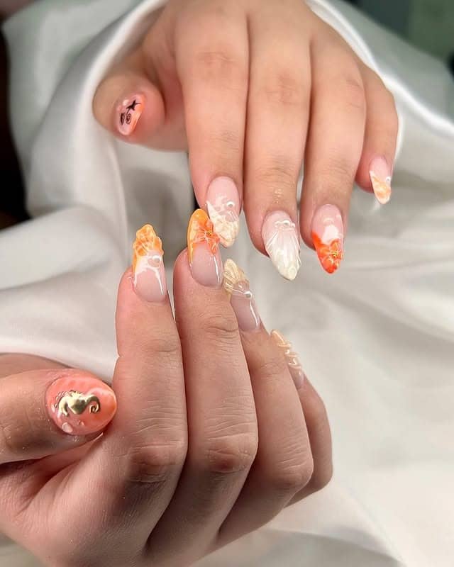 10. Sunrise Shells - simple beach nail ideas