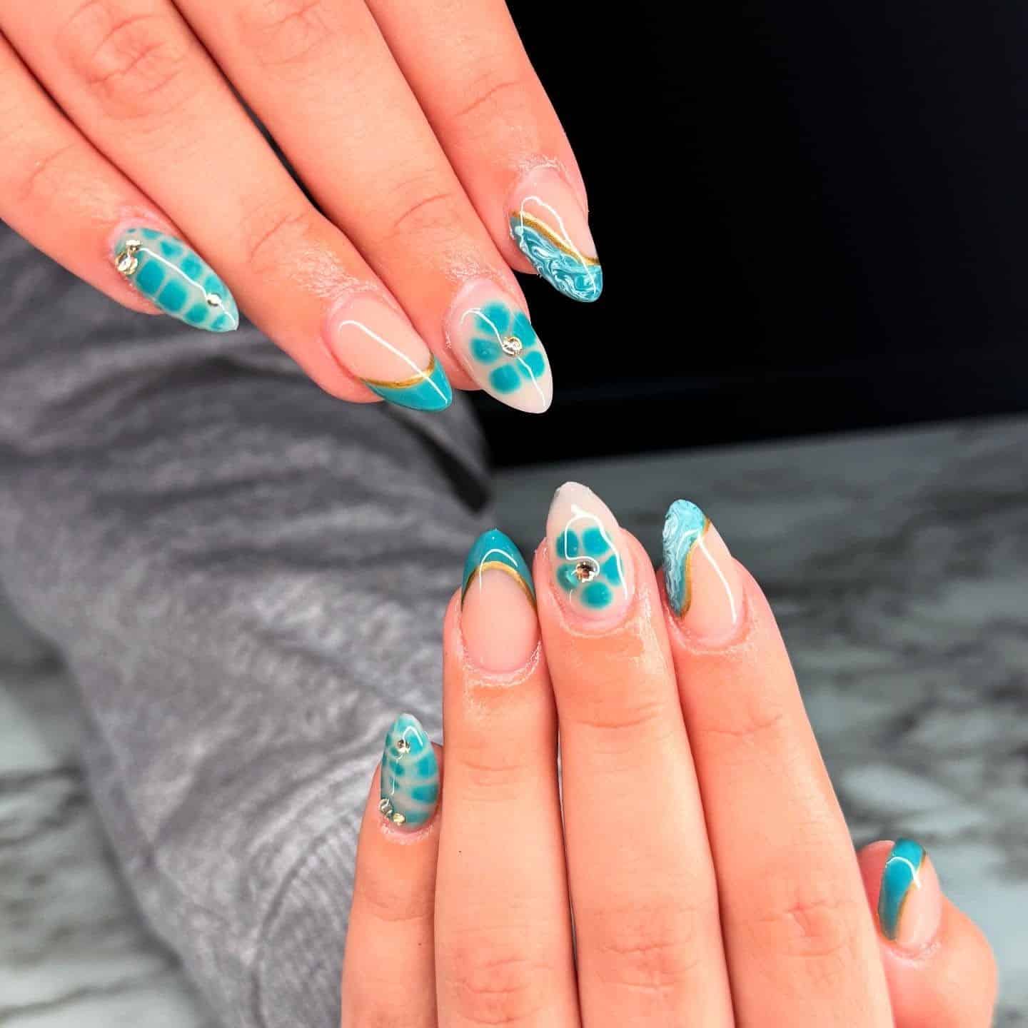 13. Turquoise Reef Elegance - simple beach nail ideas
