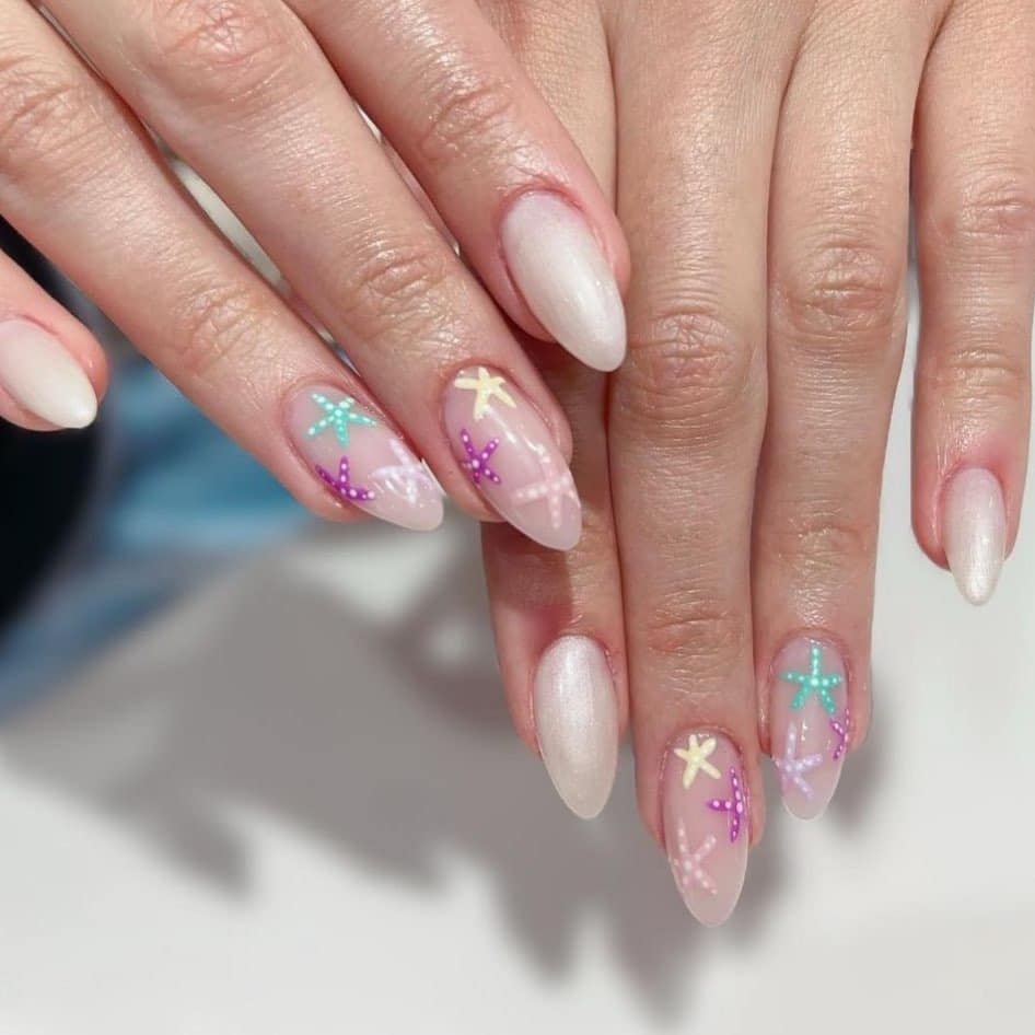 18. Pastel Starfish Dream - simple beach nail ideas