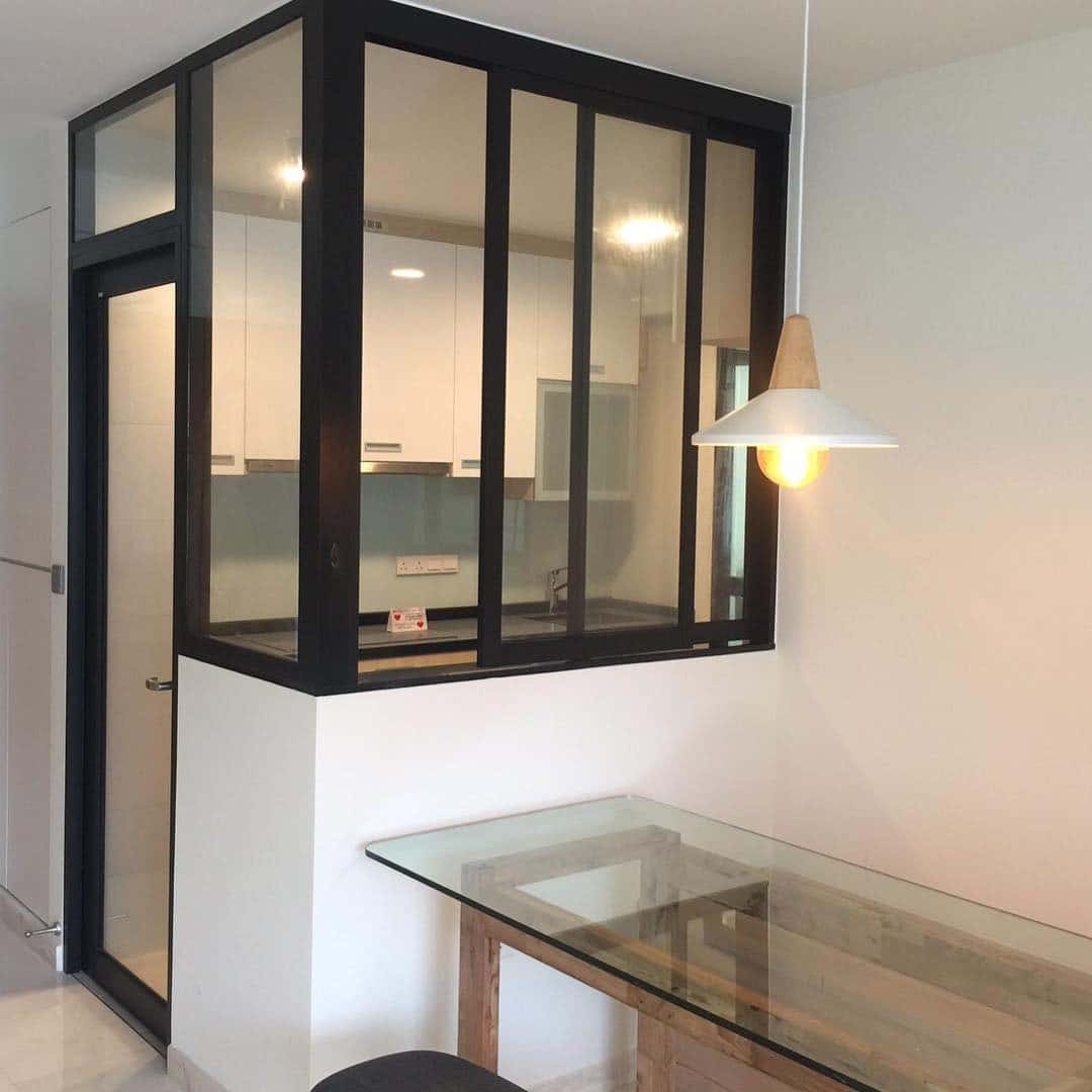 4. Compact Glass-Enclosed Kitchen Nook - kitchen and living room divider ideas