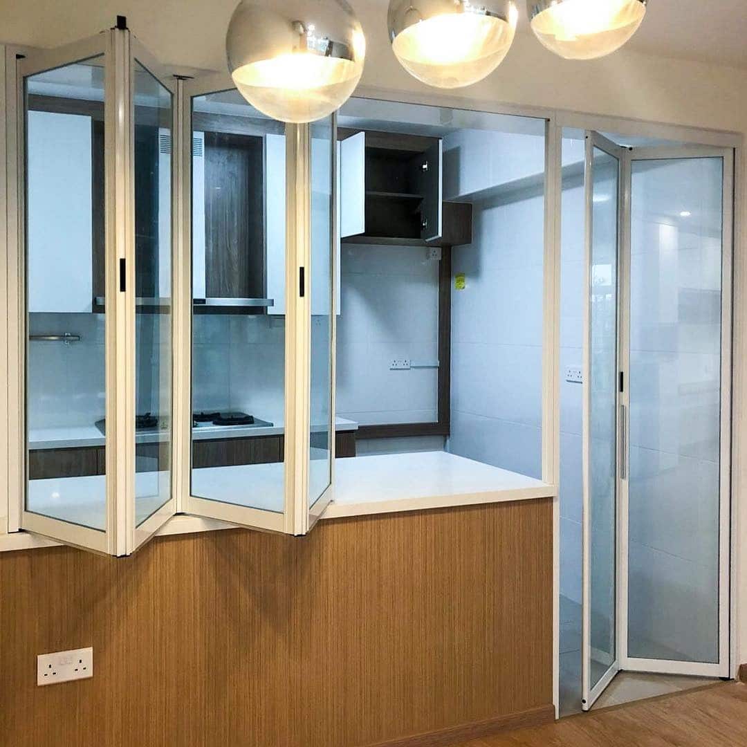 6. Bright White Folding Partition Kitchen - kitchen and living room divider ideas