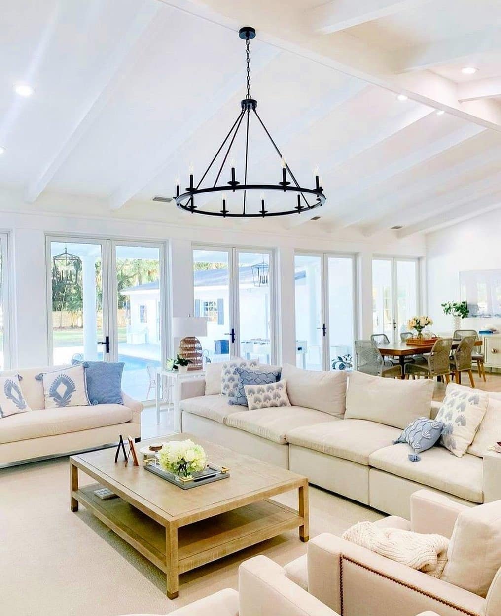 4. Coastal Comfort with a Rustic Touch - living room chandelier ideas