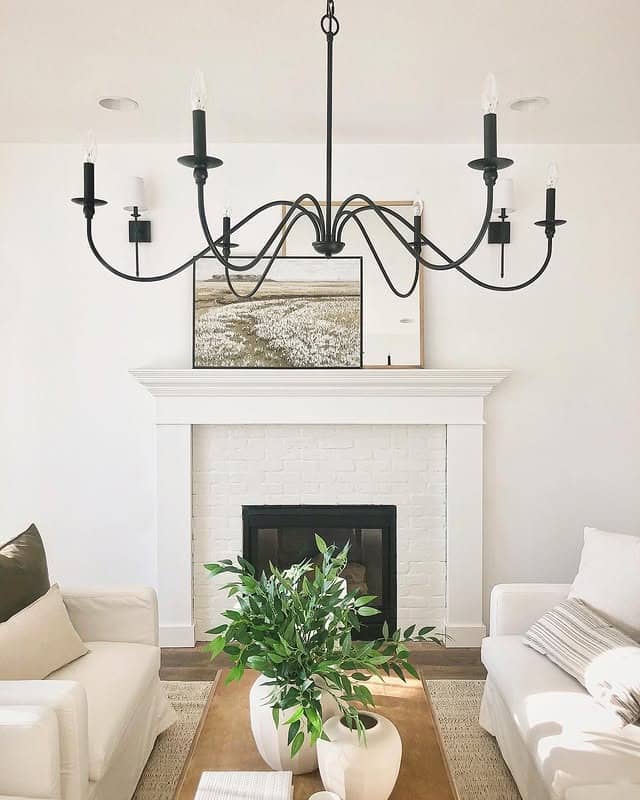 13. Minimal Charm in Monochrome Neutrals - living room chandelier ideas