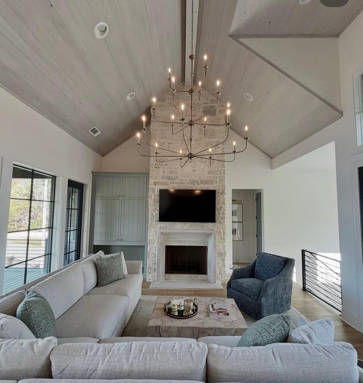 16. Rustic Refinement with Layered Textures - living room chandelier ideas