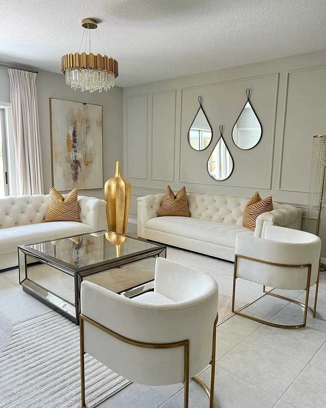 22. Modern Glamour in White and Brass - living room chandelier ideas