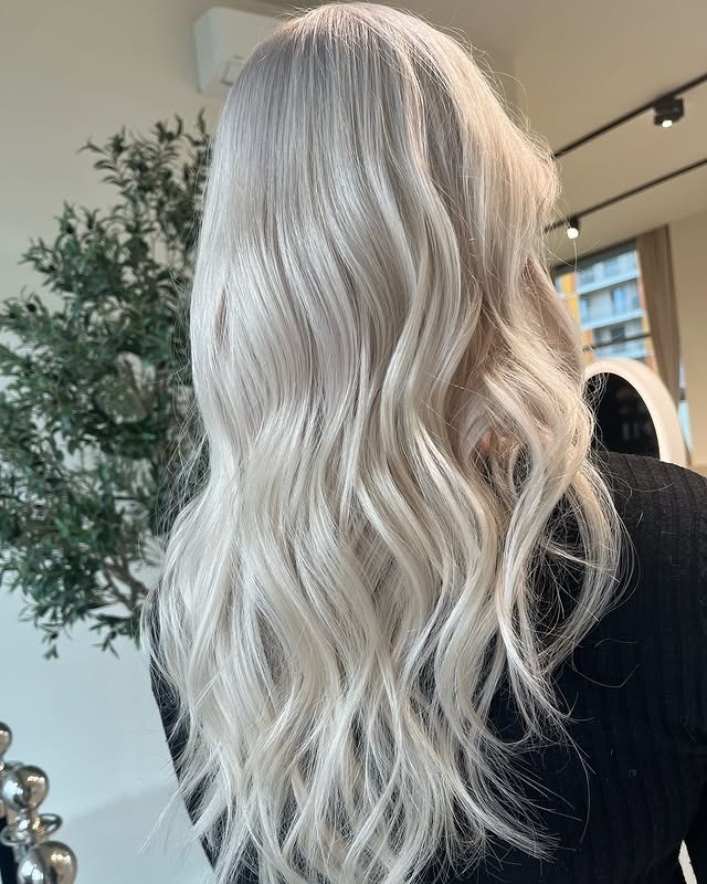 6. Cool Platinum Cascading Waves - Platinum Blonde Hair