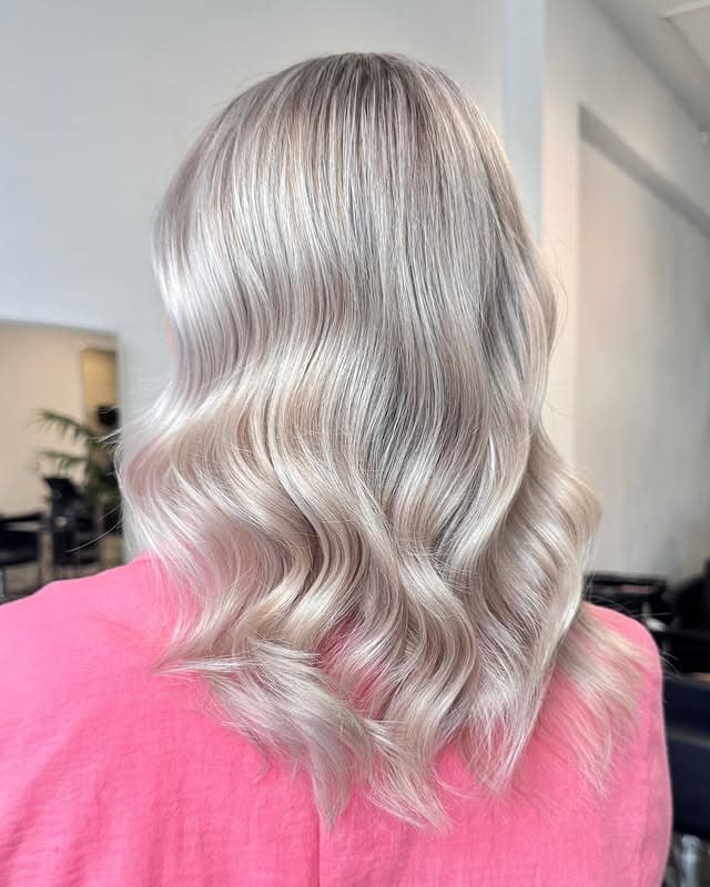 9. Champagne Platinum Gloss Waves - Platinum Blonde Hair
