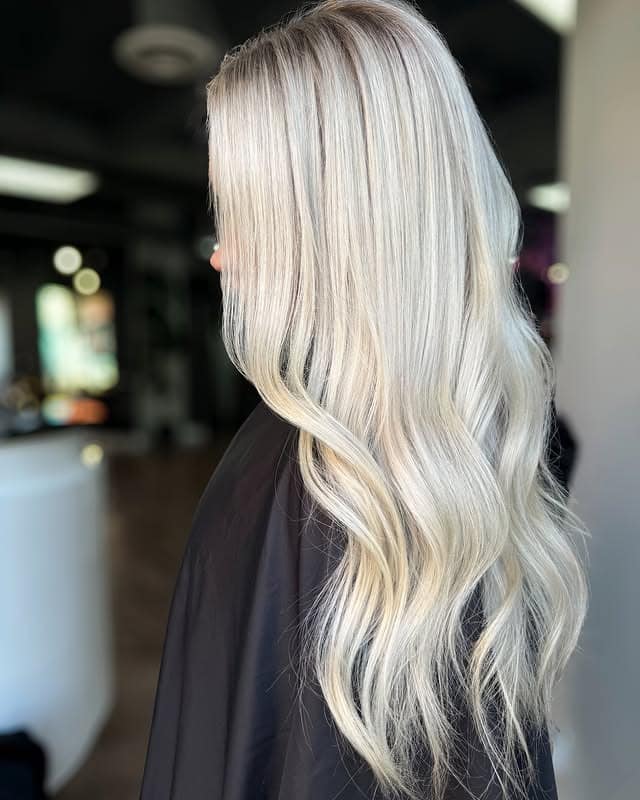 10. Rooted Platinum Elegance - Platinum Blonde Hair