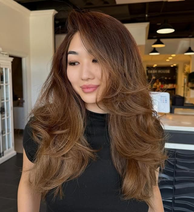 1. Voluminous Butterfly Layers in Caramel Brunette - Butterfly Haircut for Women