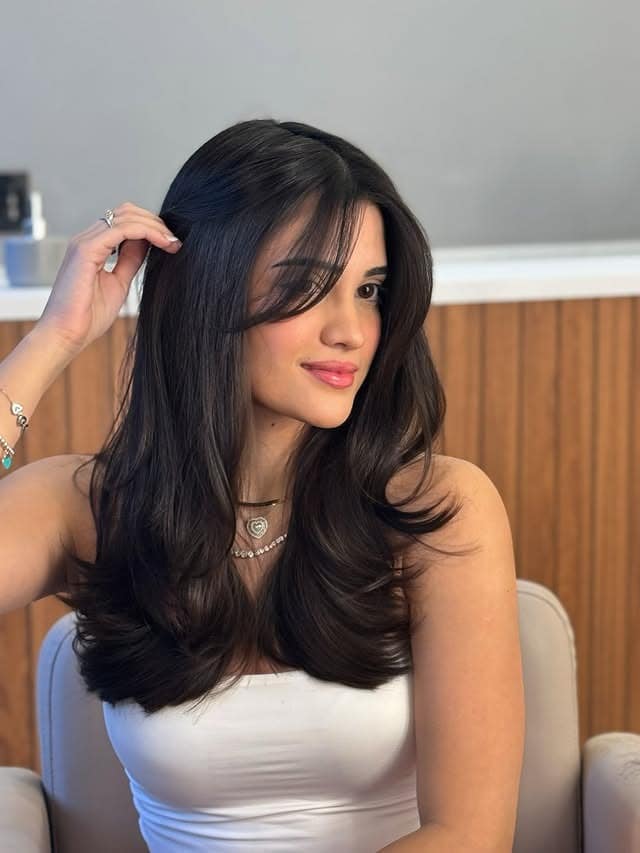 3. Glossy Espresso Butterfly Layers with Curtain Bangs - Butterfly Haircut for Women