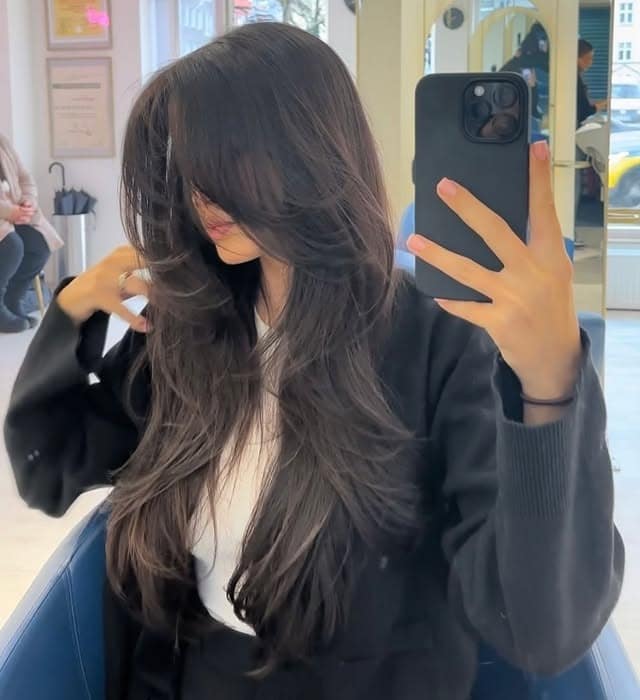 11. Soft Butterfly Layers in Midnight Brown - Butterfly Haircut for Women