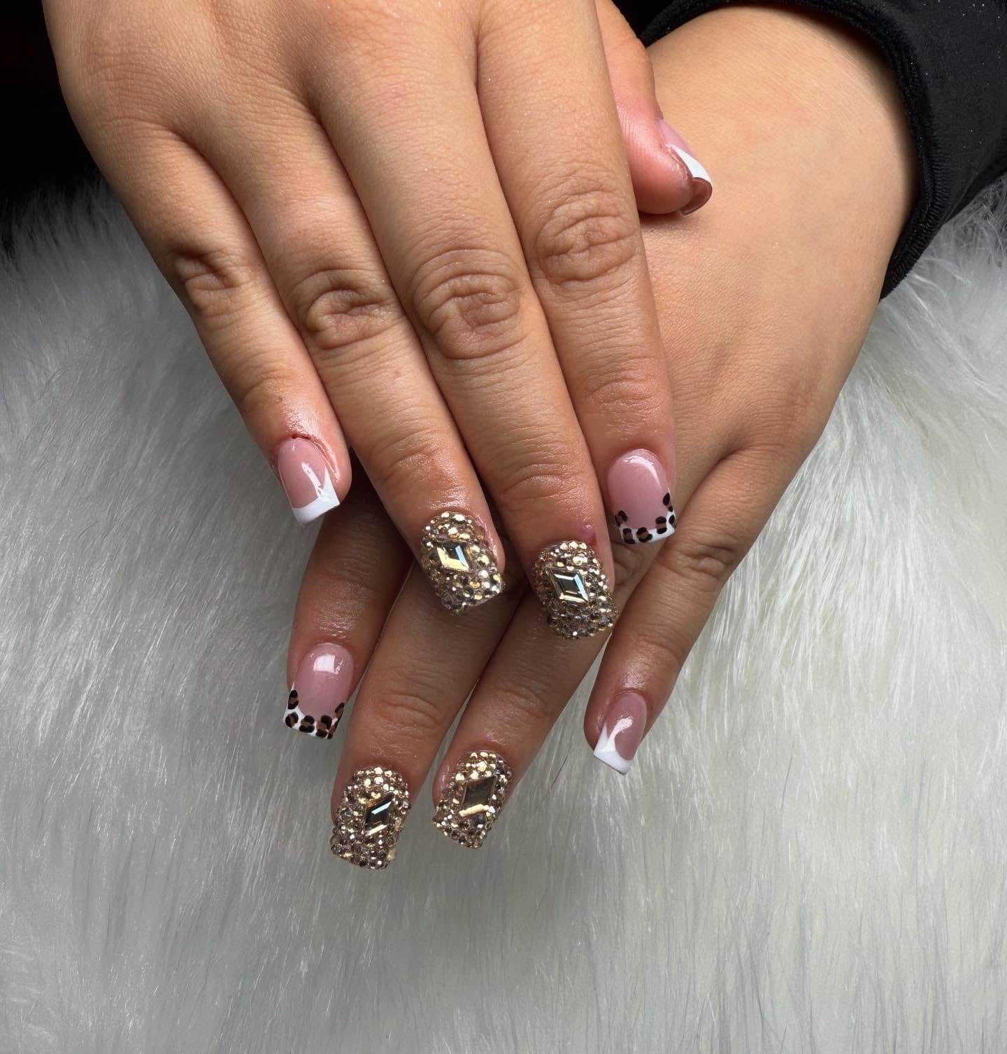 2. Golden Luxe French Tips with Studded Detail - simple diamond nail ideas