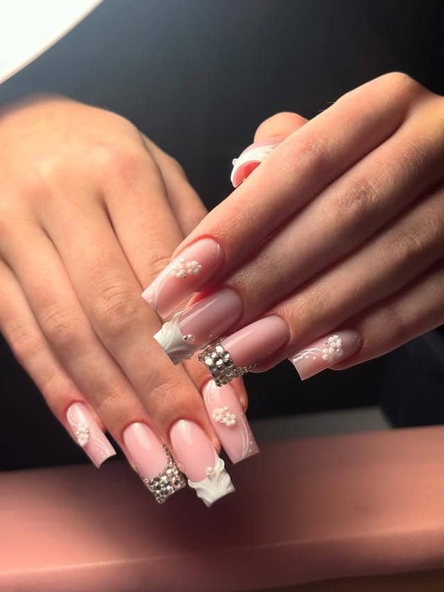 3. Soft Pink 3D Floral Nails with Diamond Borders - simple diamond nail ideas