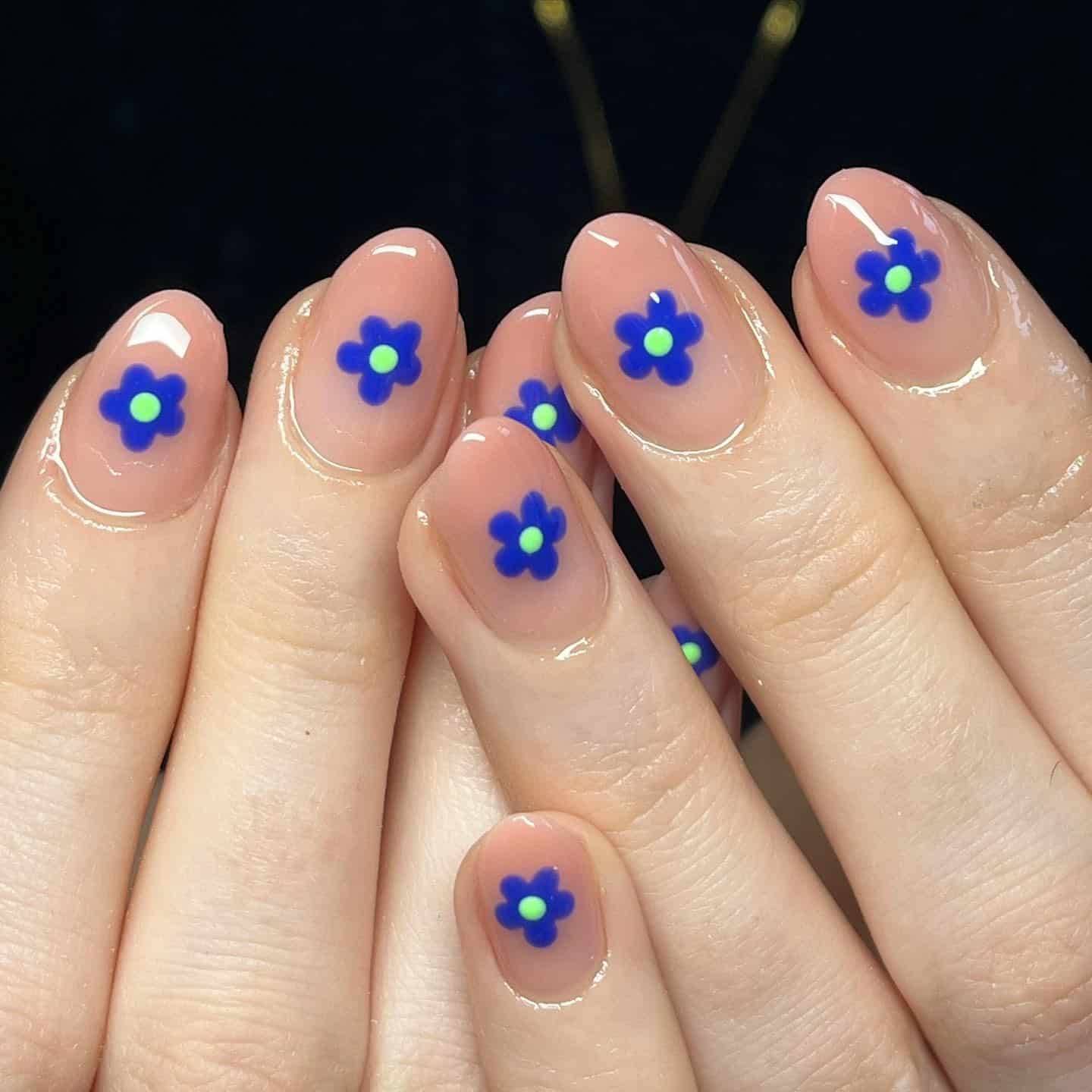 5. Electric Blue Blossoms - simple floral nail ideas