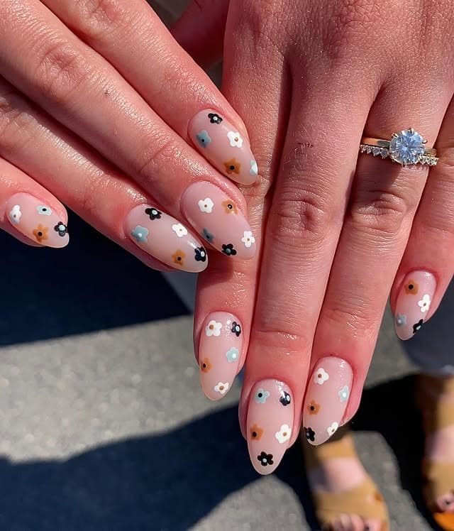9. Neutral Retro Florals - simple floral nail ideas