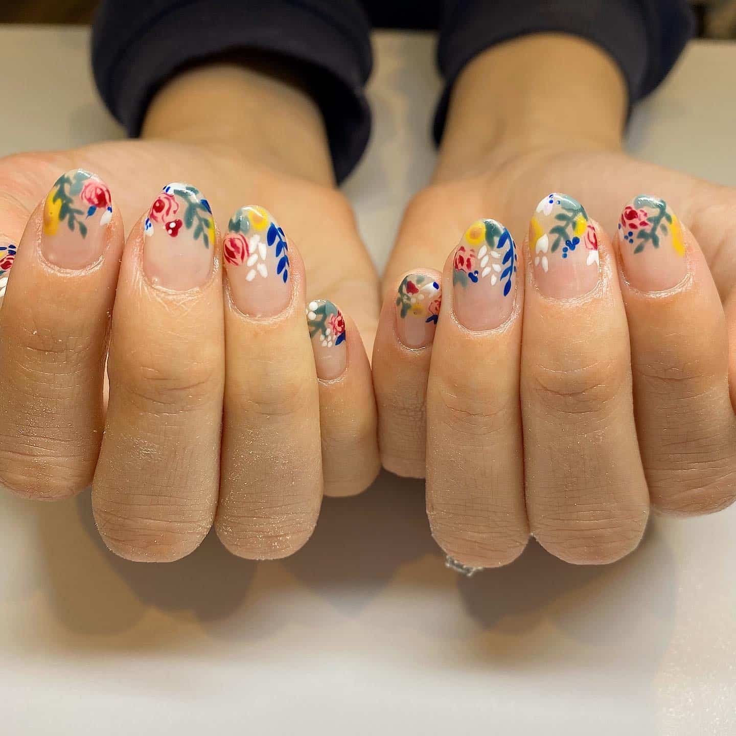 10. Vibrant Folk Garden - simple floral nail ideas