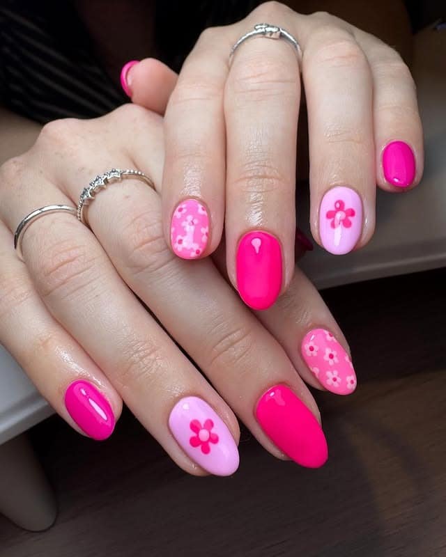 11. Neon Blossom Duo Nails - simple floral nail ideas