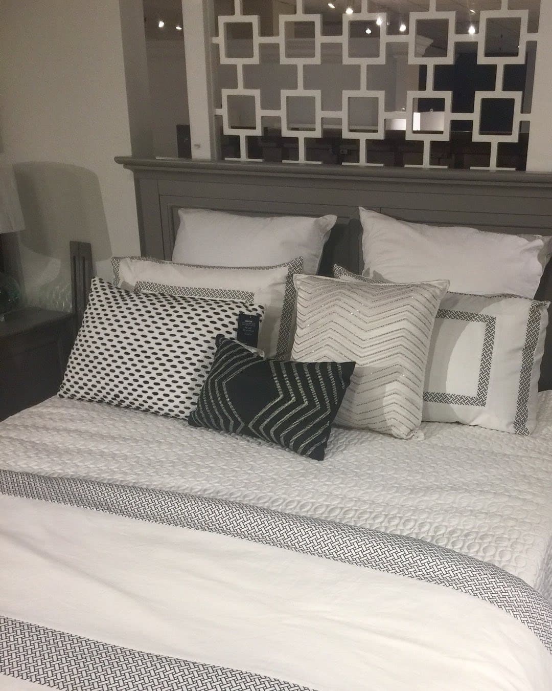 18. Pattern-Layered Monochrome Bedding Ensemble - gray, black and white bedroom ideas