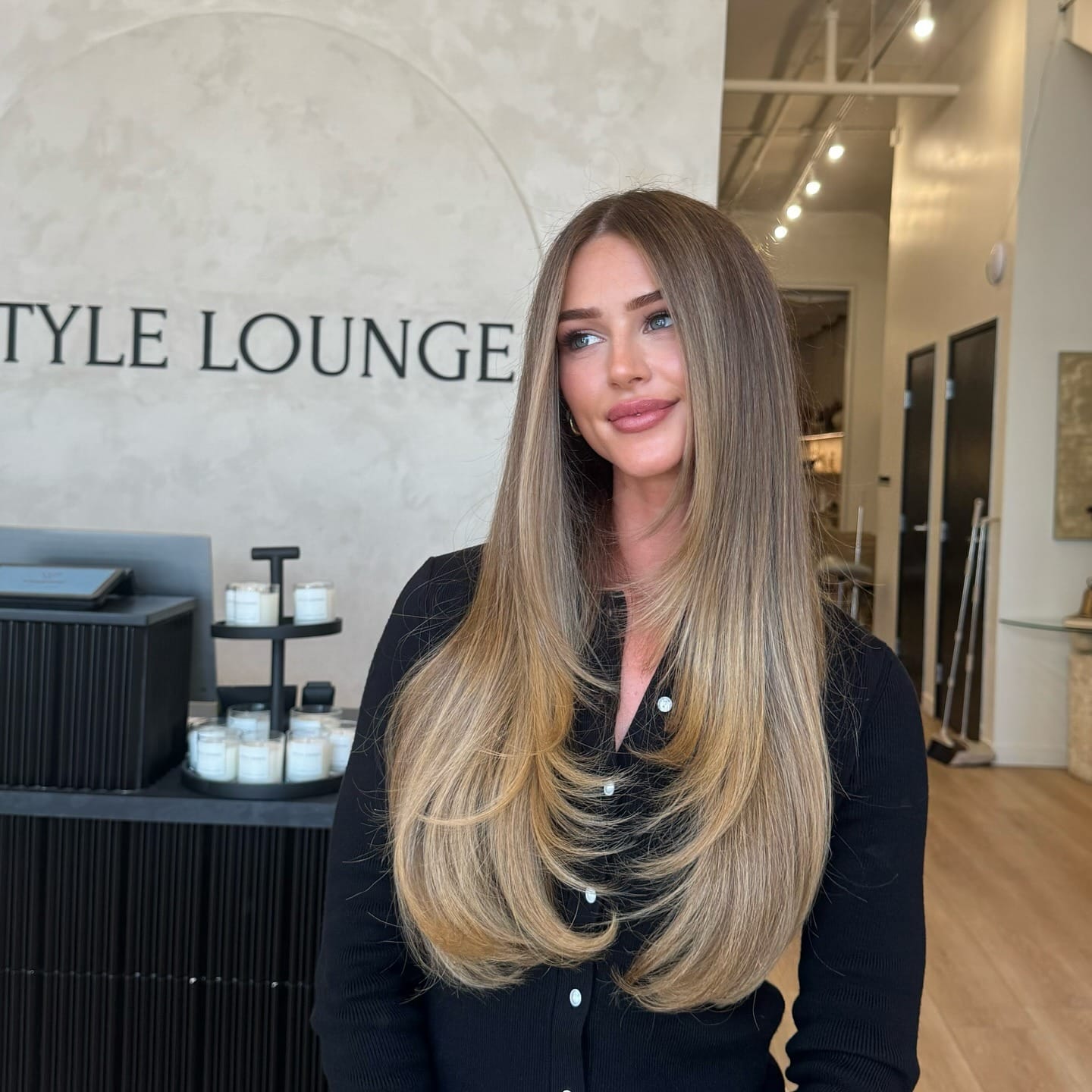 16. Straight Sandy Blonde with Long Rounded Layers - Sandy Blonde Hair Color