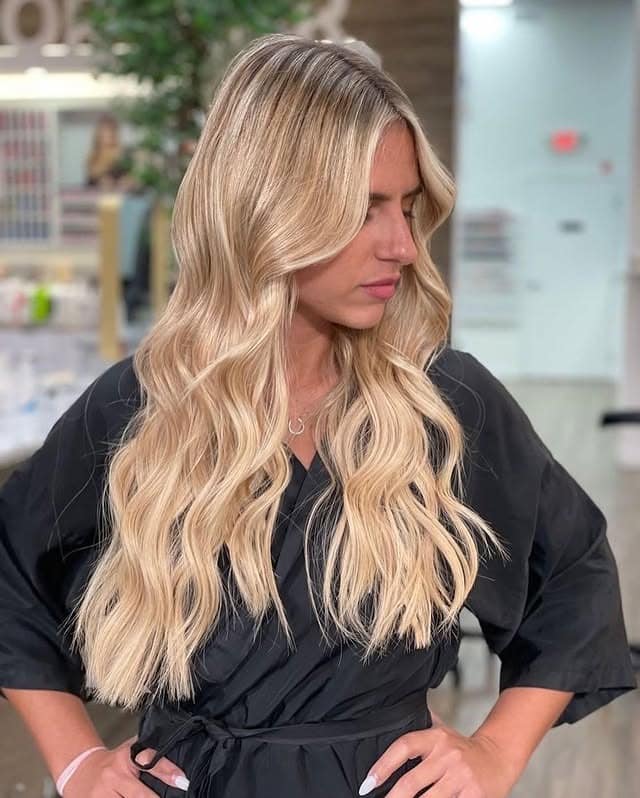 17. Creamy Sandy Blonde with Long Glam Waves - Sandy Blonde Hair Color