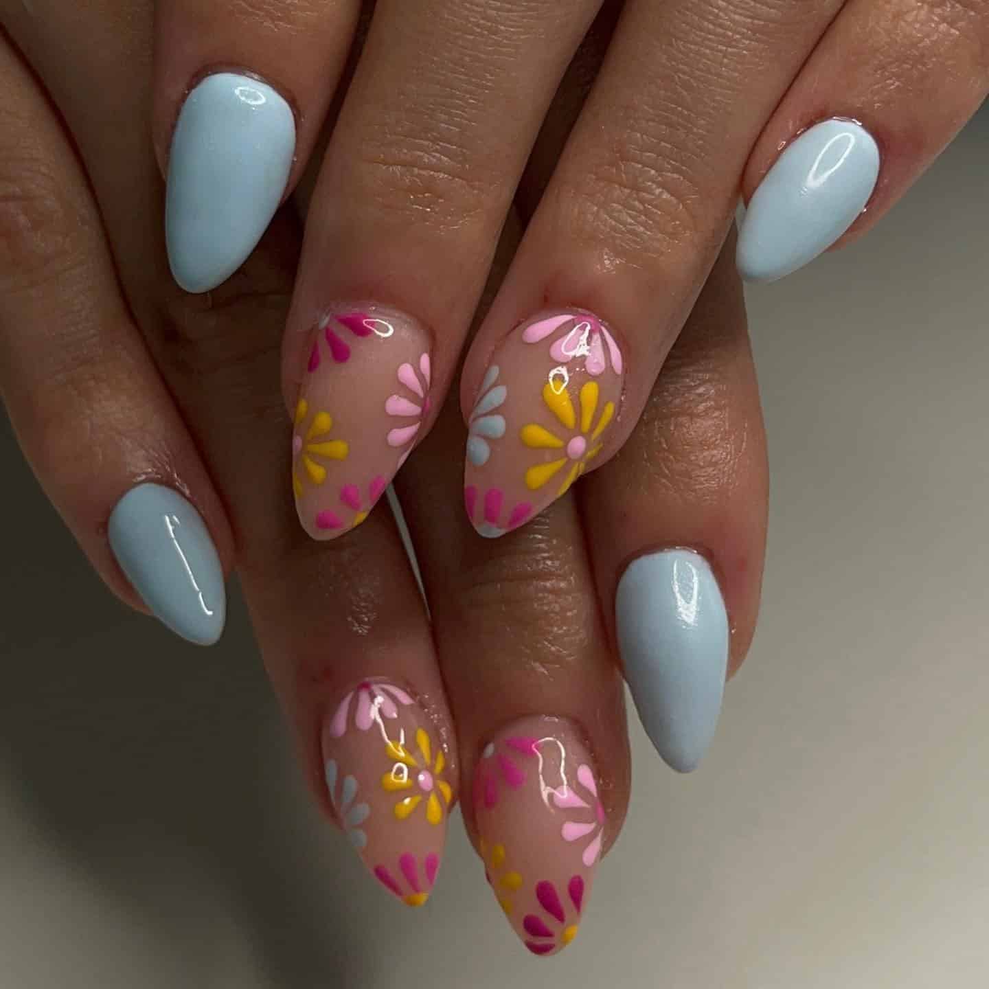 11. Baby Blue Almond Nails with Colorful Daisy Accents - spring almond nail ideas