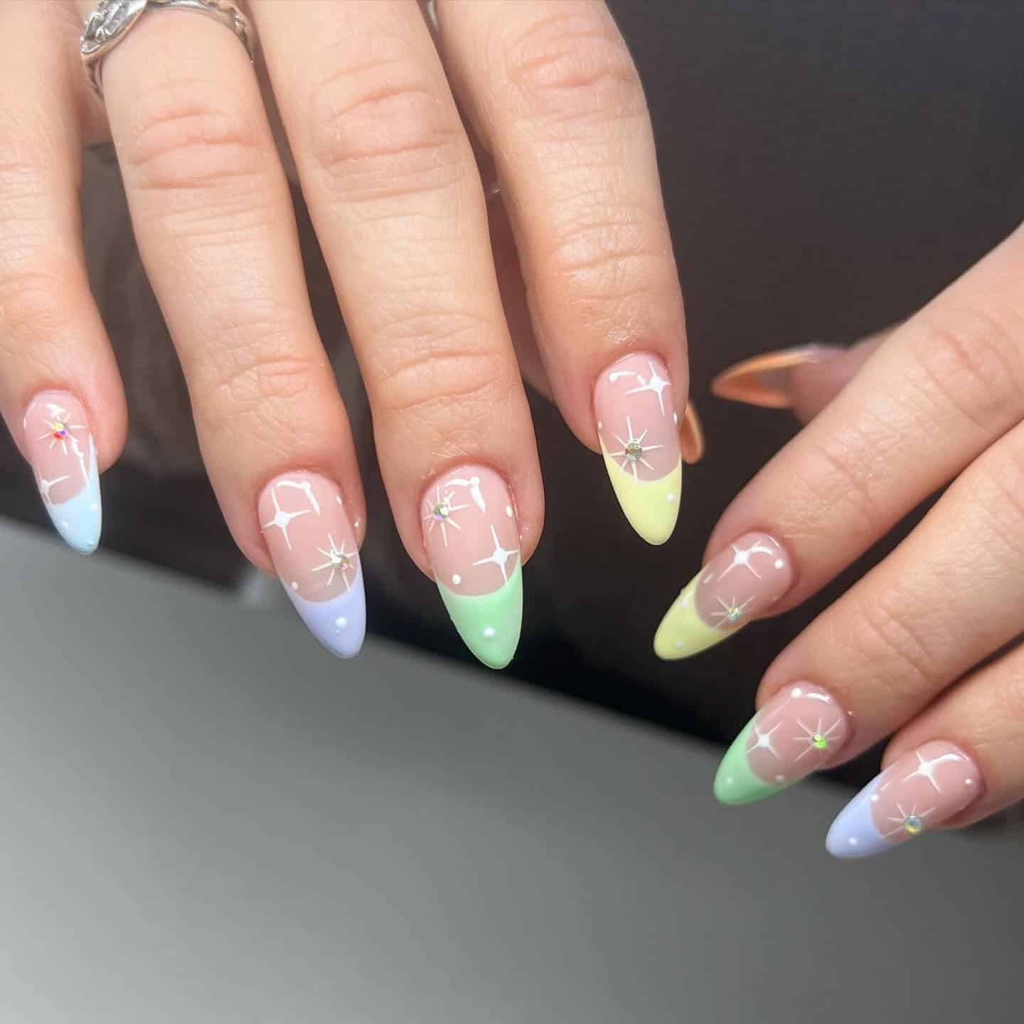18. Pastel Starburst Almond Nails with Soft Gradient Tips - spring almond nail ideas