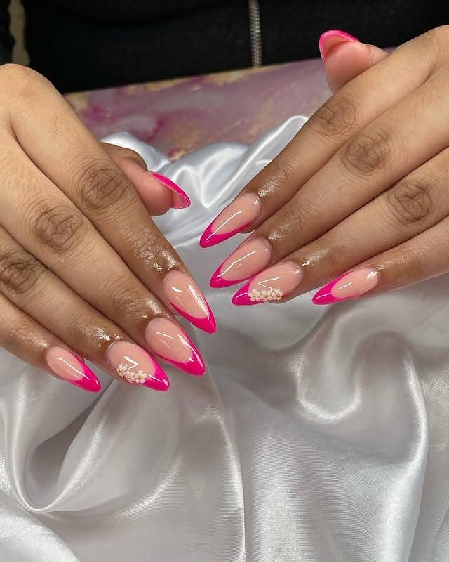 19. Fuchsia French Almond Nails with Dainty Flowers - spring almond nail ideas