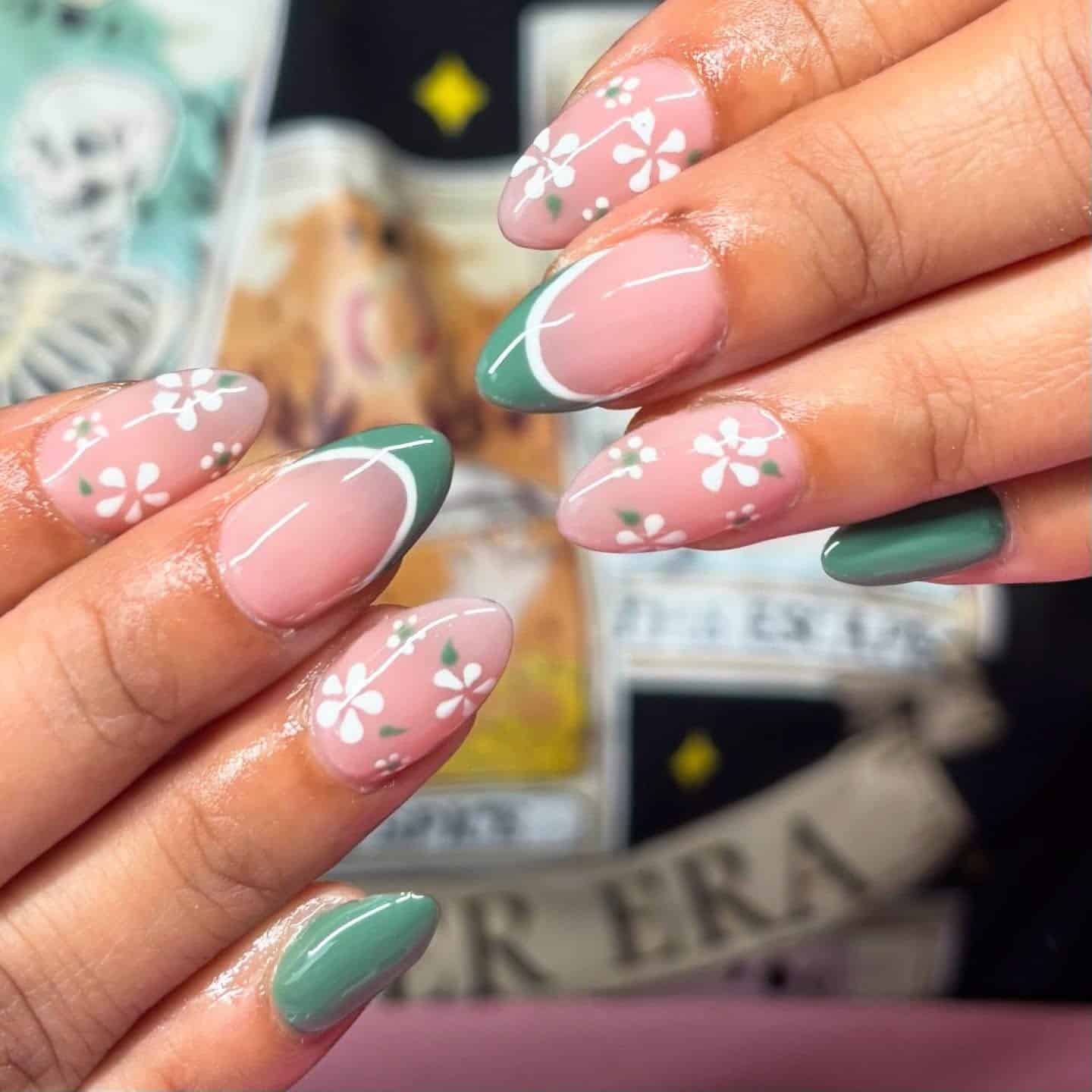 20. Green French Almond Nails with White Spring Blossoms - spring almond nail ideas