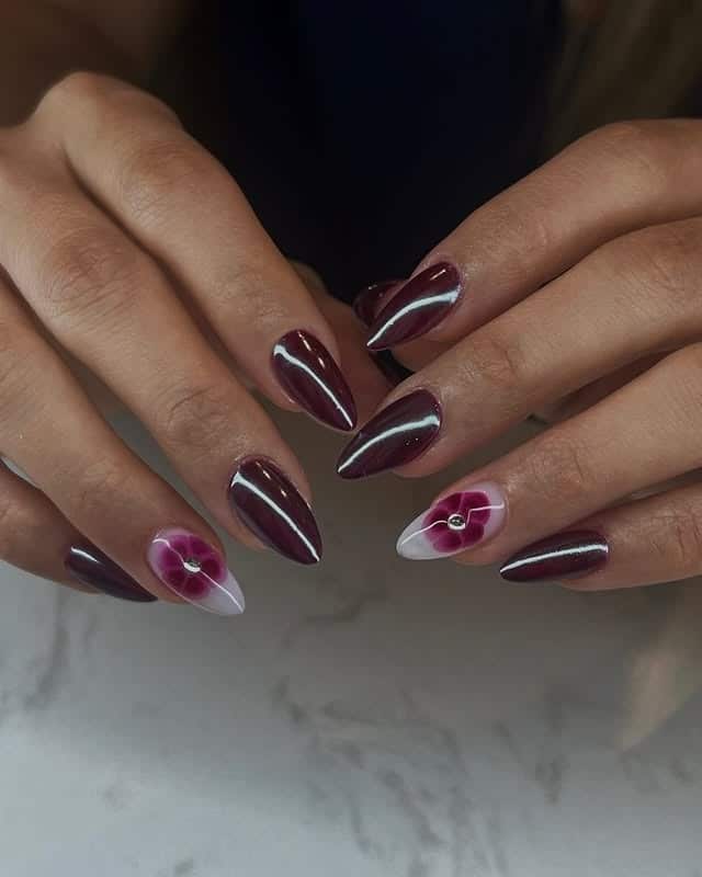 22. Deep Plum Almond Nails with Floral Accent Artwork - spring almond nail ideas