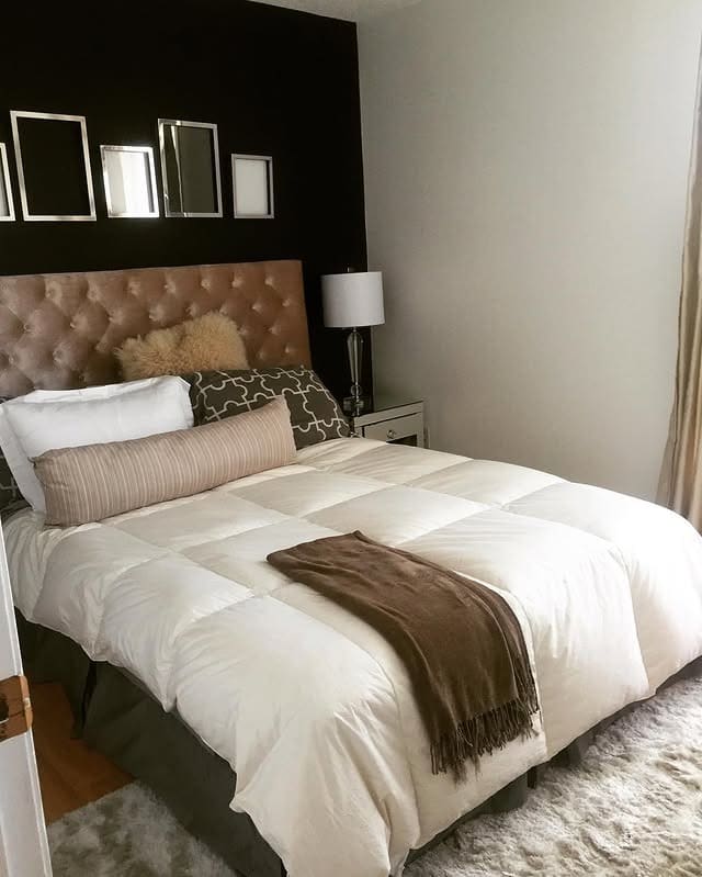 2. Moody Contrast Bedroom With Soft Neutrals - apartment bedroom ideas