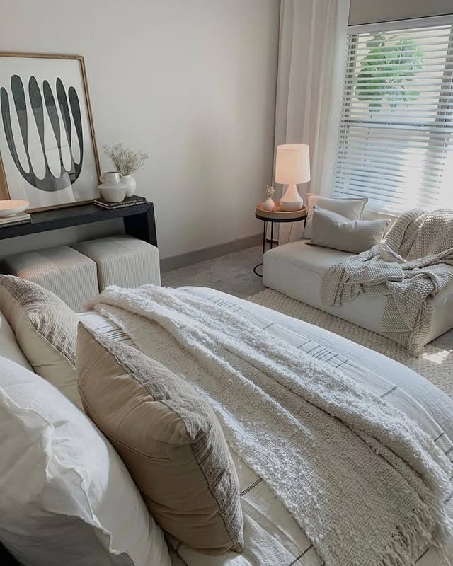 11. Creamy Minimal Bedroom With Soft Neutrals - apartment bedroom ideas