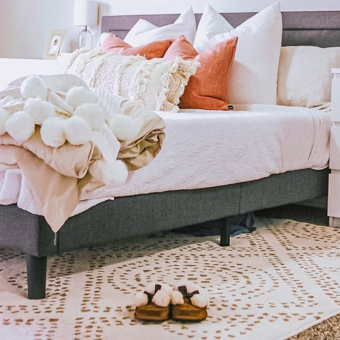 14. Peach and Cream Cozy Accent Bedroom - apartment bedroom ideas