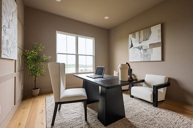 2. Soft Taupe Walls with Minimal Black Accents - paint colors for office ideas