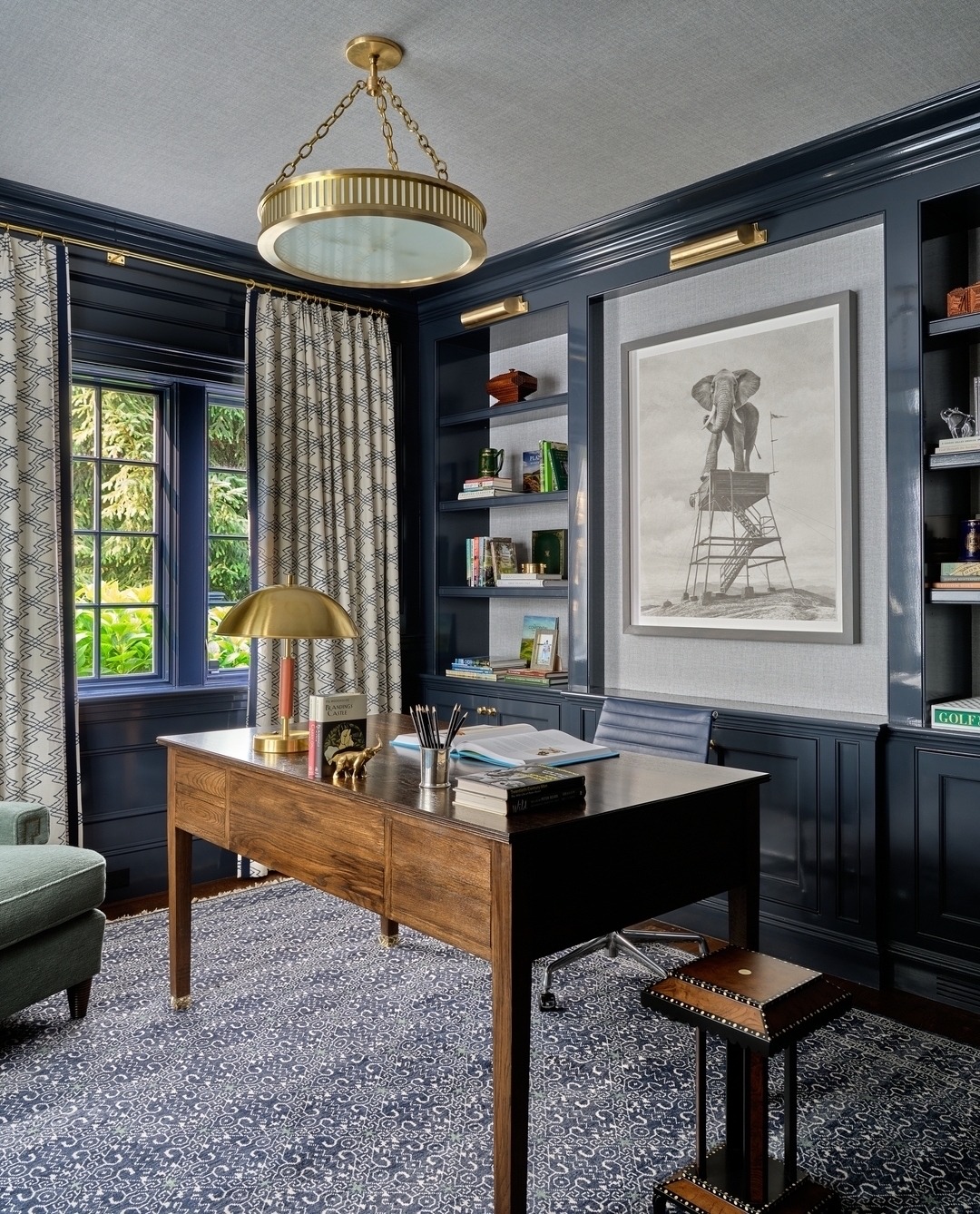 12. Ink Blue Paneling with Classic Wood Accents - paint colors for office ideas