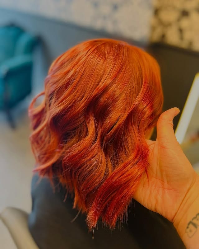 15. Warm Ginger Waves on a Short Crop - Orange Hair Color