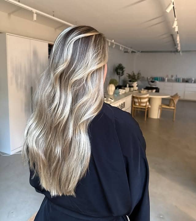 9. Chic Dark Blonde Bob with Bright Dimension - Dark Blonde Hair Color with Highlights