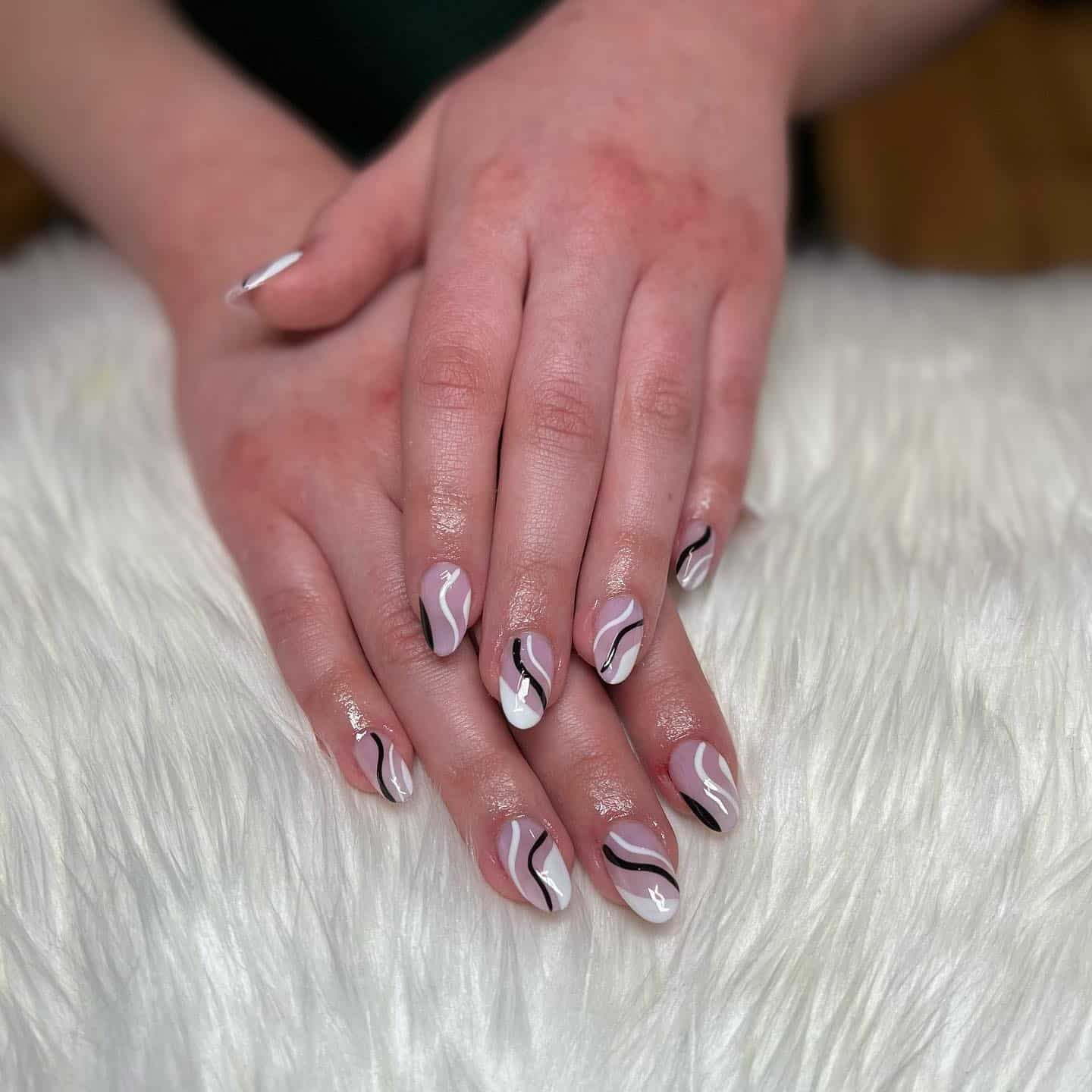 2. Monochrome Swirl Mix on Short Almond Nails - squiggly nail ideas